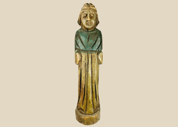 Antique European folk art figurine, 18th–19th century, hand-carved wood with painted surface, depicting a robed figure.