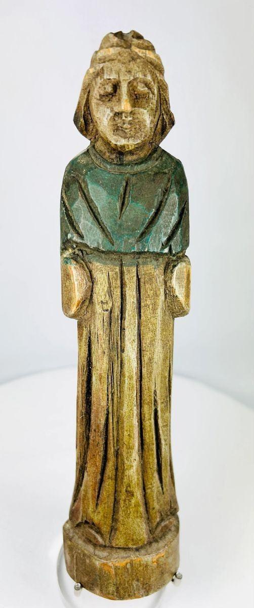 Antique European hand-carved wooden folk art figurine, 18th–19th century, front view with traces of original pigment.
