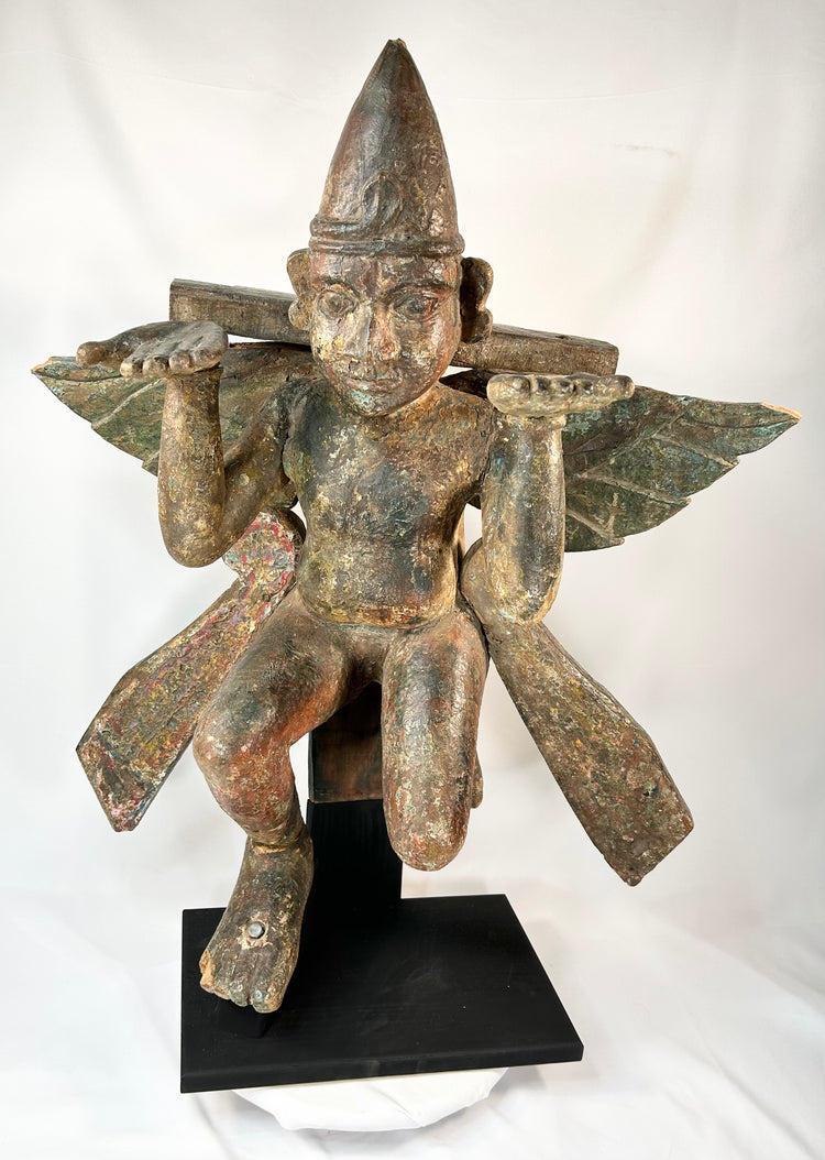 Antique Hindu Garuda deity bronze statue — frontal view on museum display base
