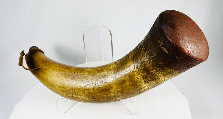 Antique firearms powder horn with leather thong, museum-marked example