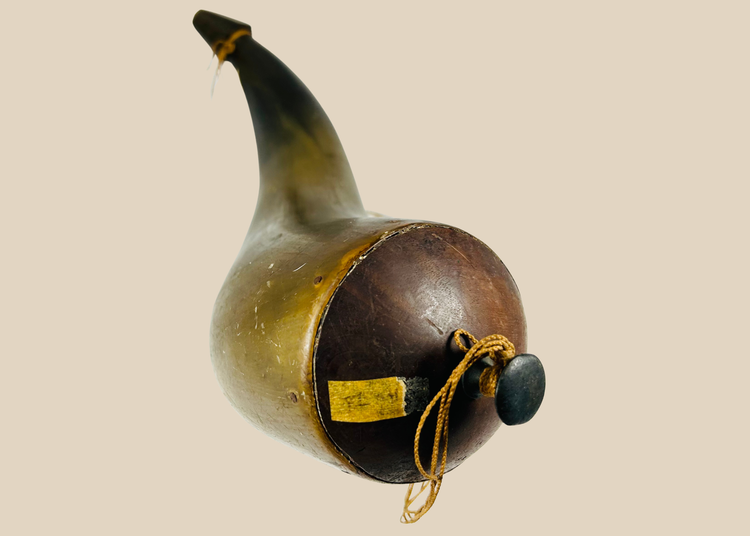 Antique horn powder vessel with curved profile and wooden stopper, 18th–19th century
