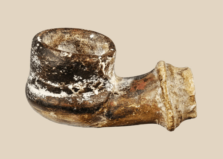 18th–19th century Middle Eastern or North African earthenware spout fragment, hand-formed with rounded bowl and narrow projecting stem, mineral encrustations, archaeological pottery piece