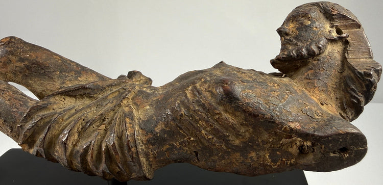 Antique carved wood figure of Christ from a Baroque crucifix with bowed head and emaciated torso