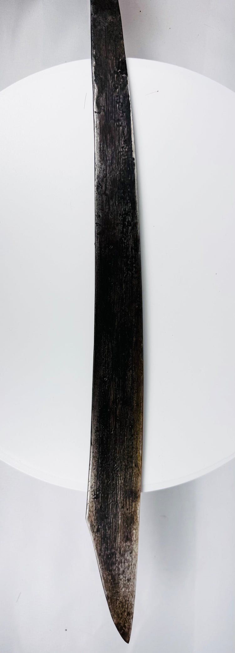 Complete Dayak Mandau sword set with blade, carved sheath, ornaments, and side knife