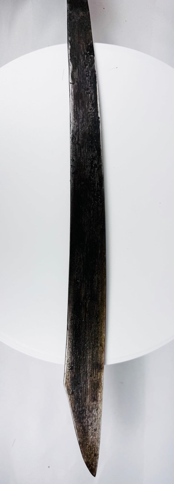 Complete Dayak Mandau sword set with blade, carved sheath, ornaments, and side knife