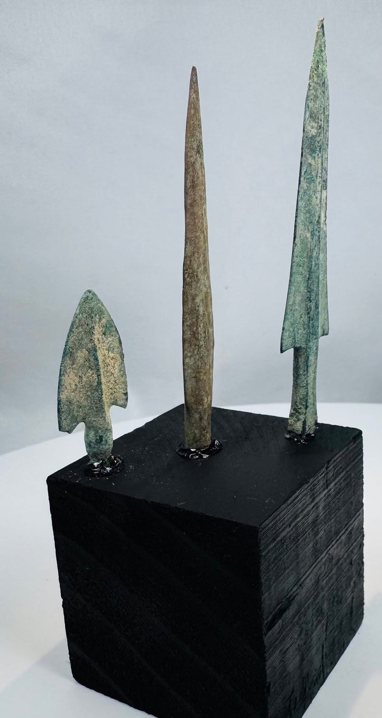 Bronze Age Western Asian weapon points with green and blue-green archaeological patina