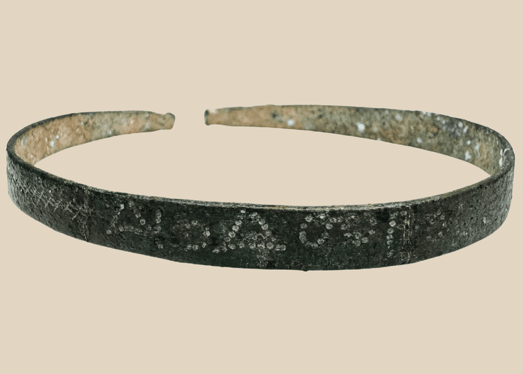 Ancient Western Asiatic bronze bracelet with open penannular form and animal-head terminals