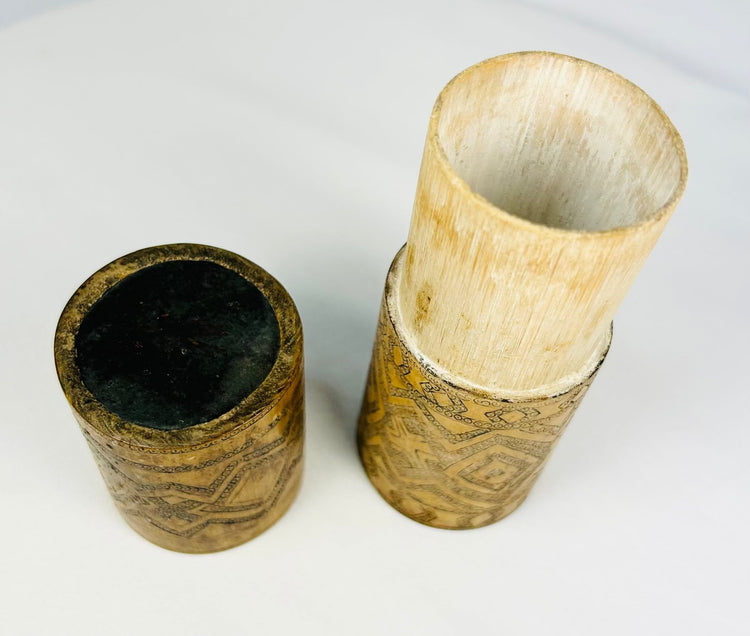 Carved bamboo cylindrical container with lid, Southeast Asian traditional storage vessel