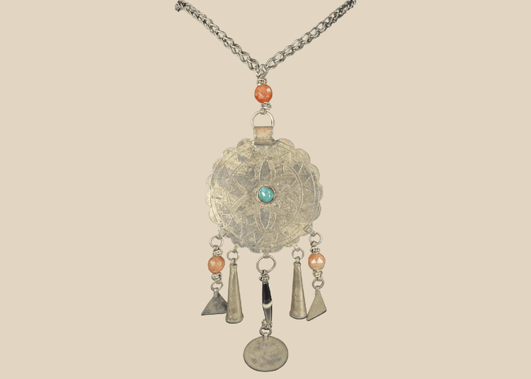 Tribal Afghan necklace with engraved circular pendant, turquoise-coloured cabochon, beads, and coin drop