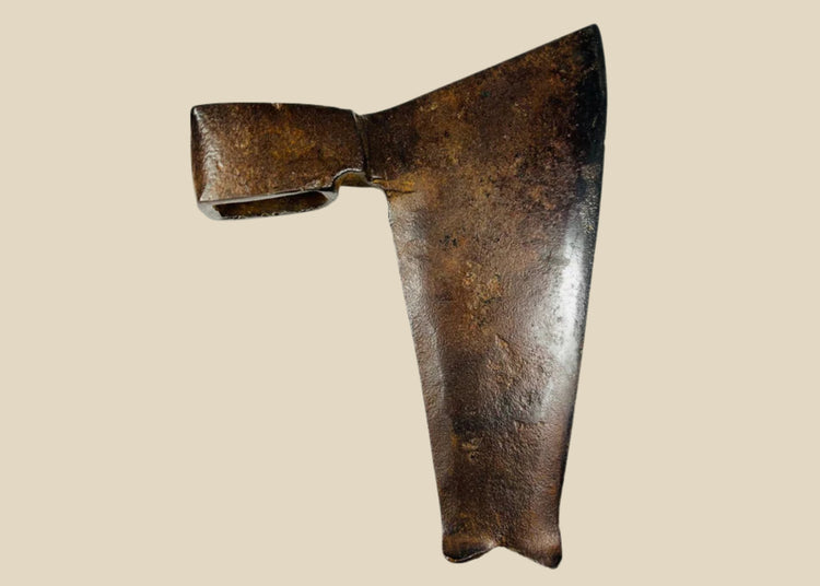 Early 19th-century Central European goosewing fishtail axe, forged iron with broad concave blade, fishtail end, and aged patina.