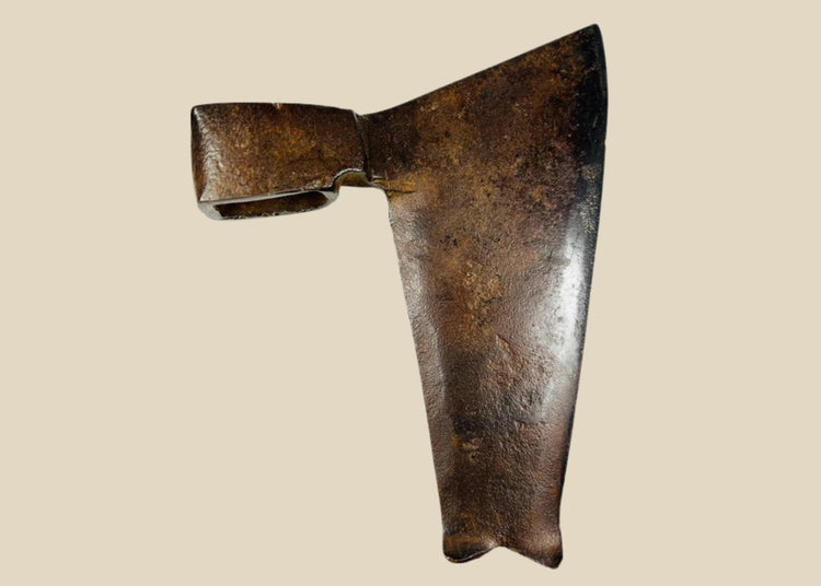 Early 19th-century Central European goosewing fishtail axe, forged iron with broad concave blade, fishtail end, and aged patina.