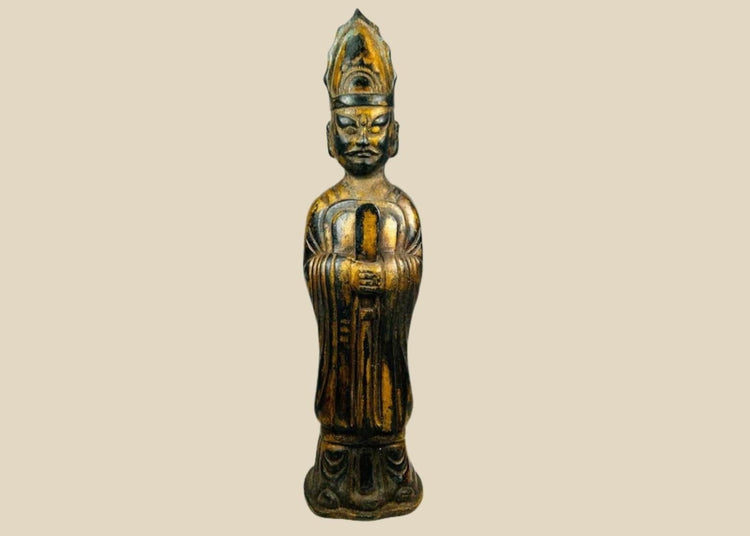 Antique Tibetan Lama bronze figure, circa 1800s Qing Dynasty. Depicts high-ranking Buddhist master with peaked ceremonial hat, monastic robes, and ritual implement. Cast bronze with gilt and lacquer remnants, aged patina, and ritual wear.