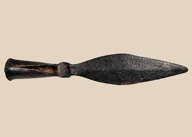 Chinese iron spearhead from the Qing Dynasty, 18th century, featuring a broad leaf-shaped blade, socketed base, square stopper, and natural wood shaft. Elite Eight Banners military weapon with patina from age and use, reflecting Qing martial traditions, tactical design, and imperial warrior culture.