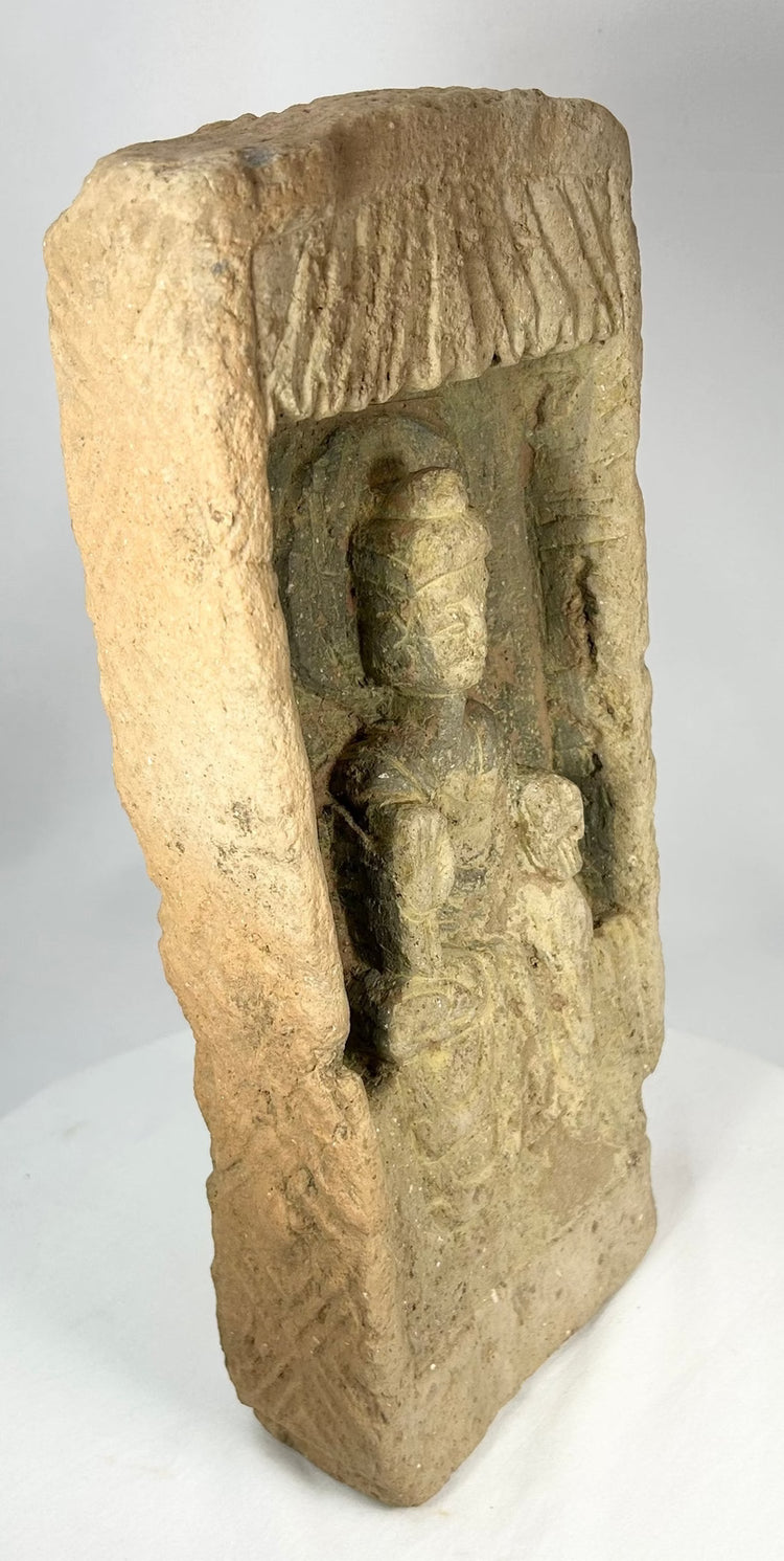 Museum-quality Northern Wei Buddha relief brick on display