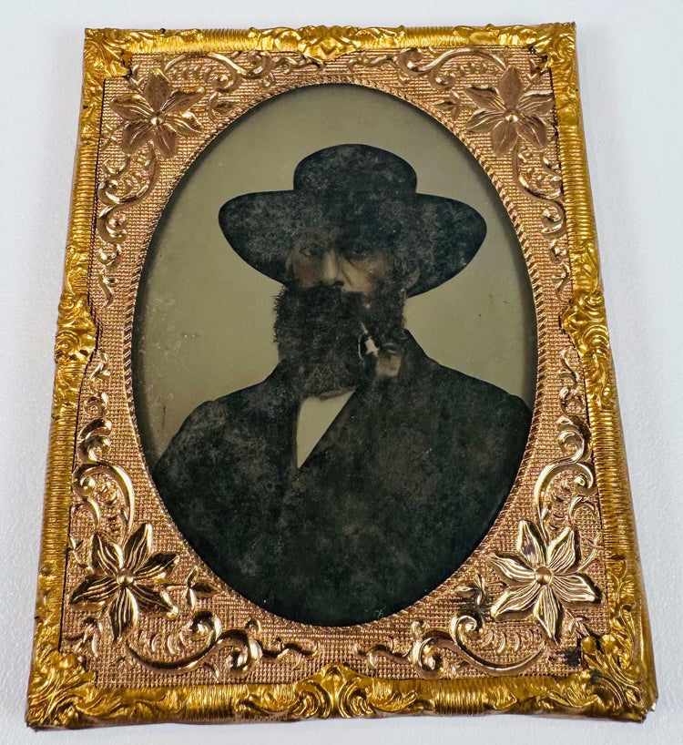 Antique cased portrait of a gentleman in formal Victorian clothing with ornate gilt-brass surround