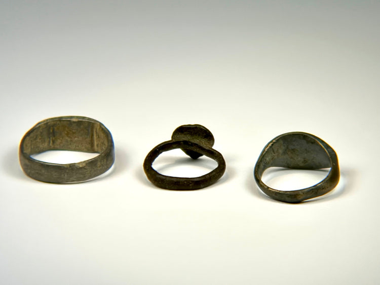 Heavy Roman to Medieval bronze ring with broad band and mottled green and brown oxidation