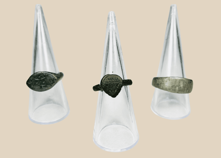 Set of three ancient European bronze finger rings with aged patina