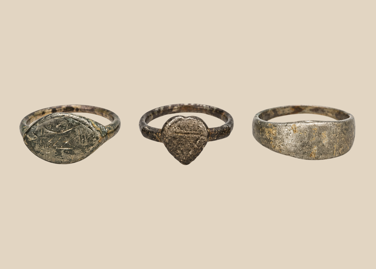 Set of three ancient European bronze finger rings with aged patina