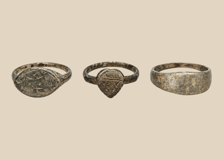 Set of three ancient European bronze finger rings with aged patina