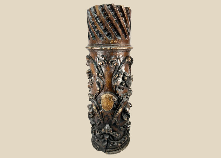 Antique Edo-period Japanese wooden temple pillar fragment, intricately hand-carved with swirling floral motifs and lattice detail, dark brown patina with areas of wear and age exposure, dating to the 18th century, originally part of a Buddhist architectural structure, showcasing traditional craftsmanship and religious artistry.