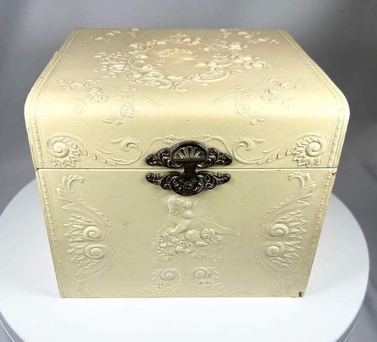 Early 1900s collar box with Arrow brand collars and molded decorative case