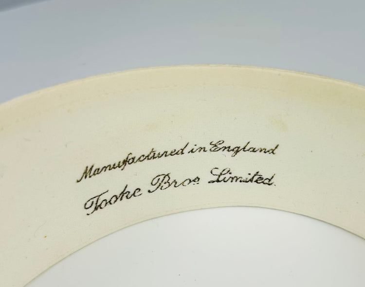 Vintage collar case with embossed decoration and period shirt collars