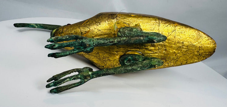 Egyptian Revival decorative sculpture with a later-applied gilt finish, verdigris patina, and graceful ibis silhouette.