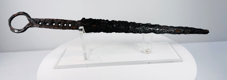 Historic European fighting dagger from the 14th century with iron hilt and prominent quillons