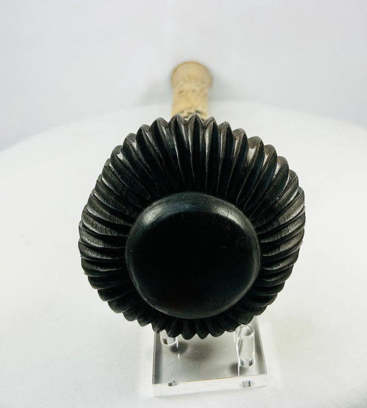 Fijian ula throwing club, circa 19th–20th century, carved hardwood with flared striking head and woven fiber grip decoration.