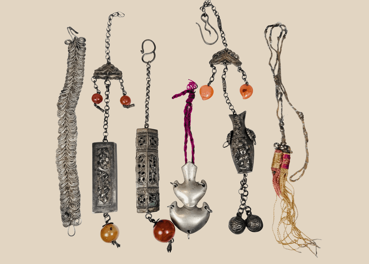 Antique Chinese chatelaine and personal ornament collection with beads, bells, amulet cases and textile tassel