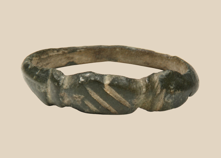 Late Roman to Early Byzantine bronze finger ring with incised linear bezel, circa 4th–6th century CE