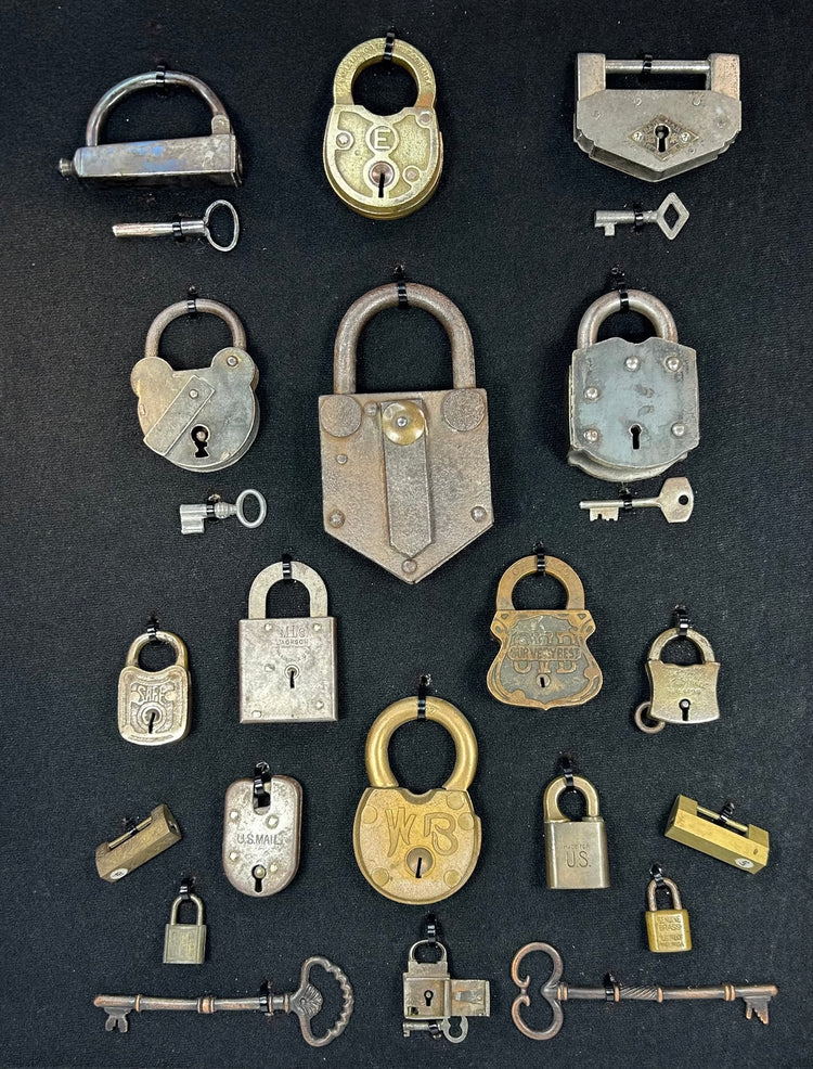 Framed collection of antique locks and keys in shadow box with industrial design