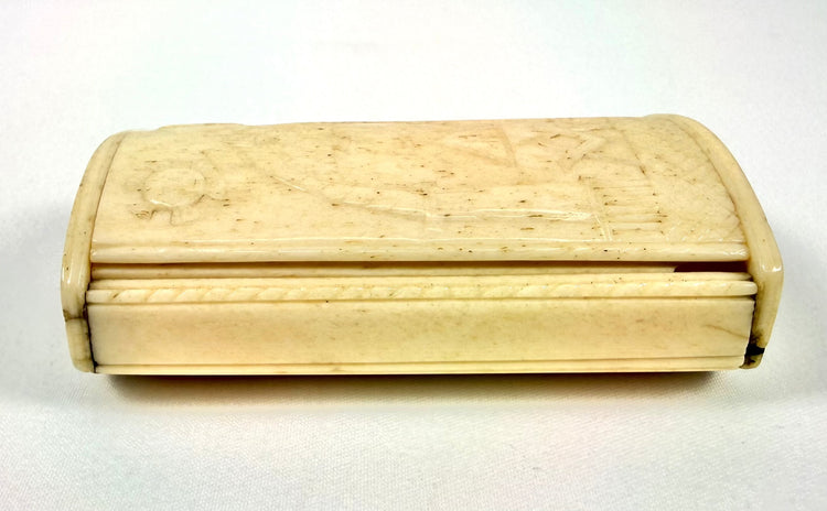 Napoleonic French POW snuff box featuring elaborate Freemasonic engravings and traditional bone craftsmanship.