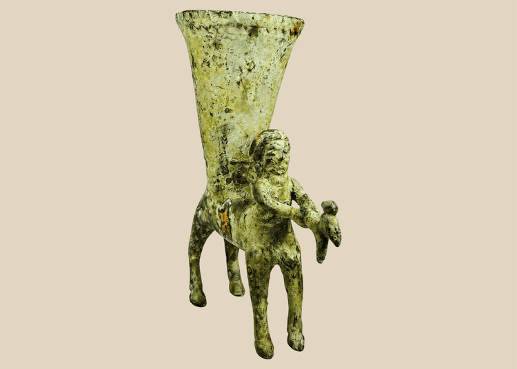 Antique bronze rhyton vessel with centaur figure holding goat