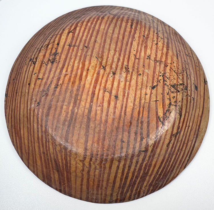 Underside of Greater Nicoya Pre-Columbian ceramic plate with closely spaced reddish-brown painted lines