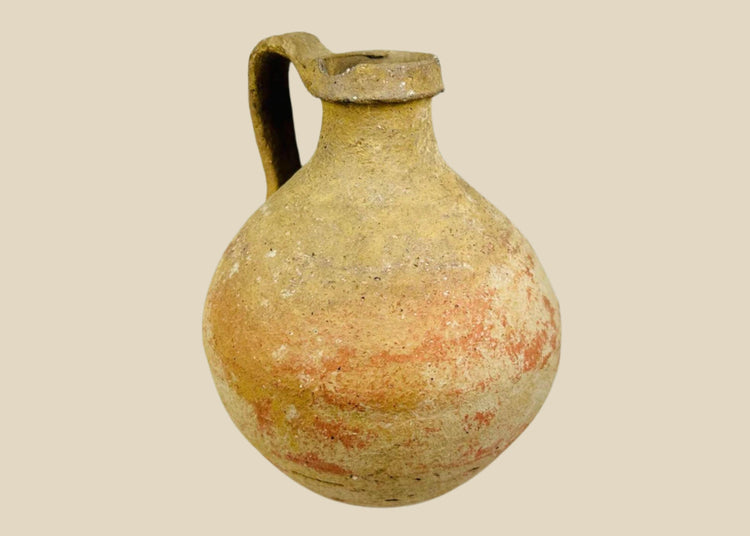 Ancient Abydos terracotta jug from Egypt with rounded body, spouted rim, and arched handle, Greco-Roman period, circa 1st century BCE–3rd century CE.