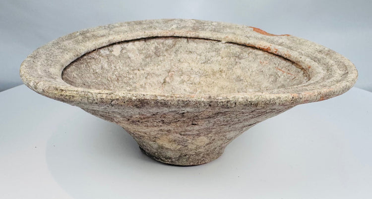 Ancient Tunisian terracotta bowl vessels from the Roman Empire with shallow basins and ringed rims.