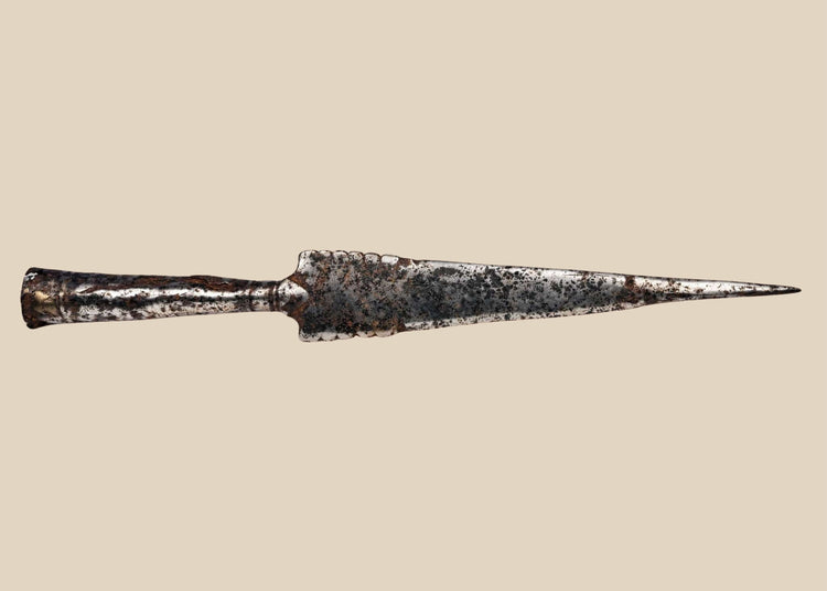 Hand forged European iron spearhead with scalloped edges and weathered patina