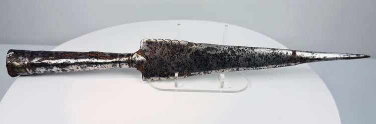 Ancient European iron spearhead with scalloped-edge blade and socketed base, circa 1st millennium CE
