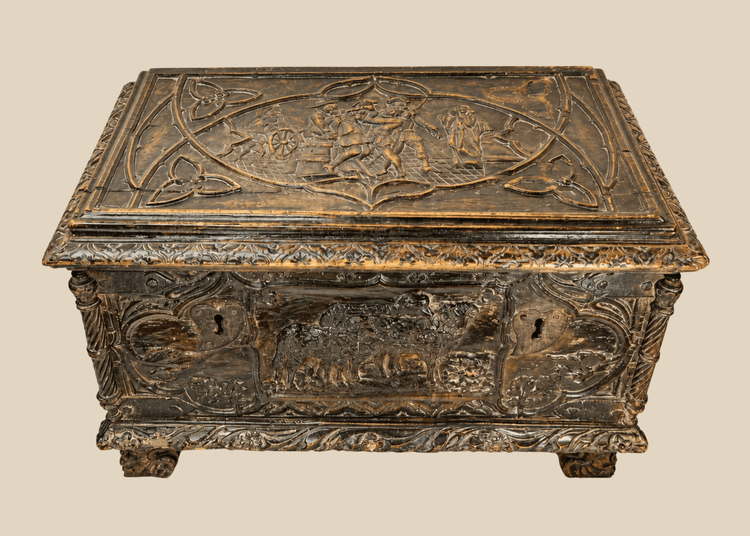 Renaissance Italian cassone chest with hand-carved figural and foliate panels, circa 16th–17th century