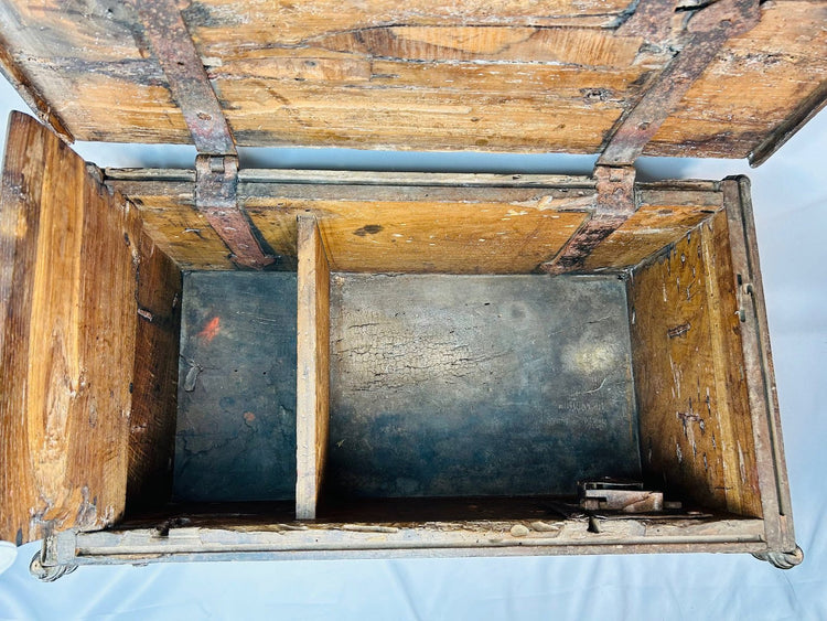 Original Renaissance carved wooden chest from Northern Italy with scroll feet and narrative figural relief