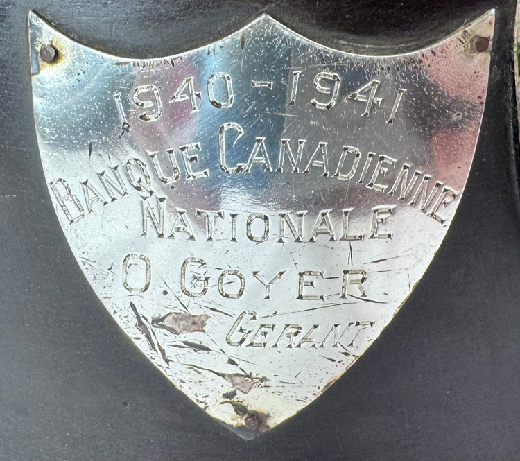Close-up of engraved championship plaque honoring the 1940–1941 league champions