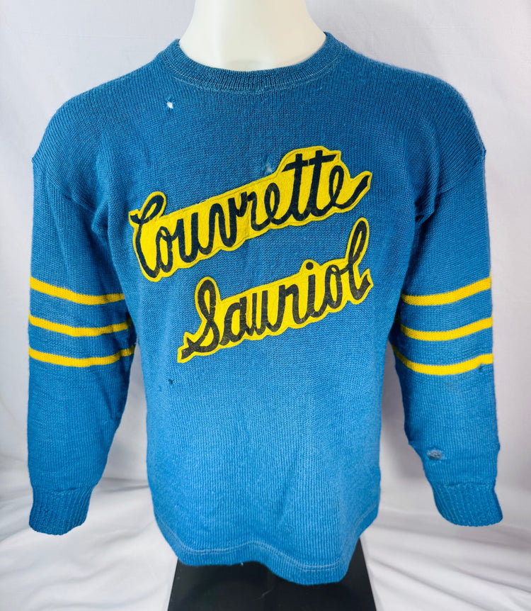 Front view of blue Couvrette & Sauriol wool hockey sweater with yellow felt lettering