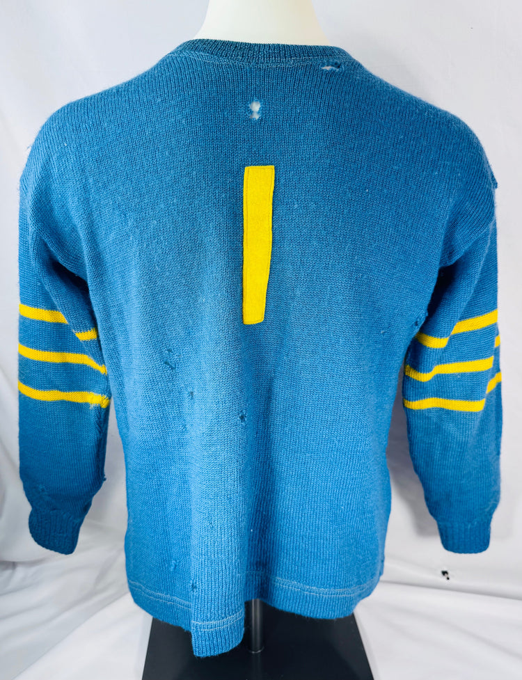Reverse view of blue Couvrette & Sauriol hockey sweater displaying number 1