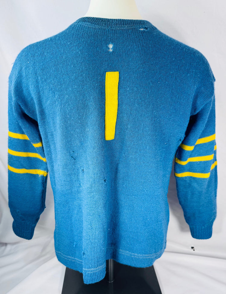 Reverse view of blue Couvrette & Sauriol hockey sweater displaying number 1