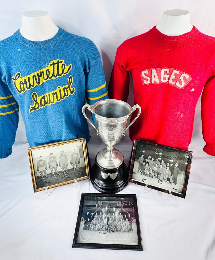Historic Montreal hockey collection with Ligue de Hockey Métropolitaine trophy, uniforms, and team photographs