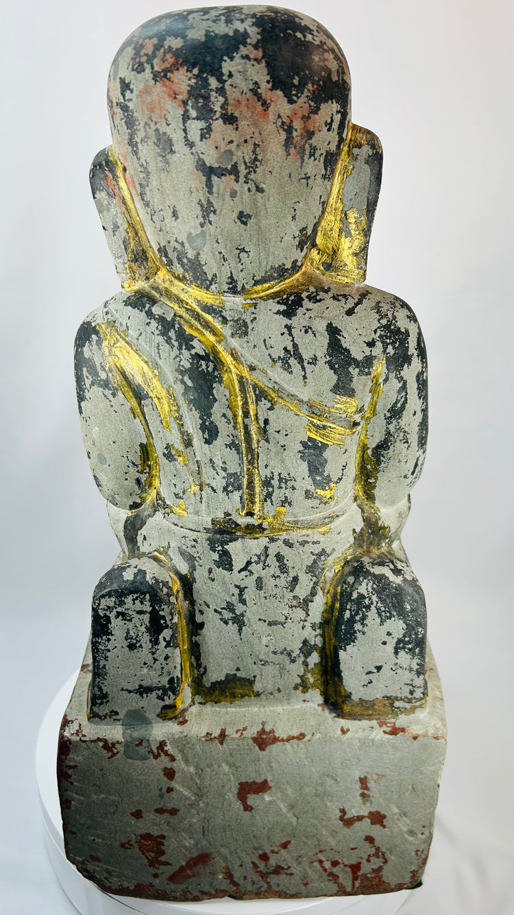 Antique Burmese Buddhist devotional sculpture with worn gilded surface and lacquer patina.