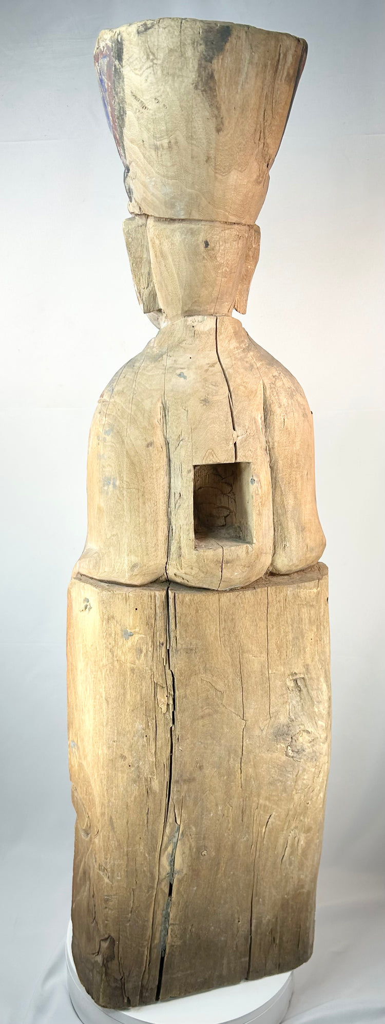 Antique Chinese shrine figure depicting a seated magistrate holding a ceremonial tablet.