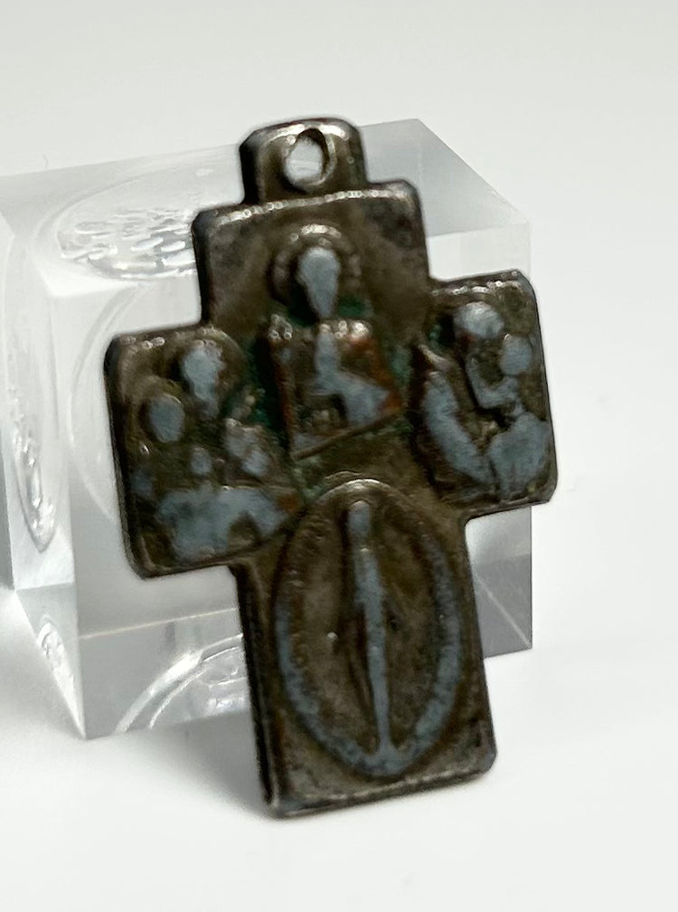 19th century Catholic bronze cross pendant featuring Virgin Mary imagery and devotional symbolism with natural aged patina
