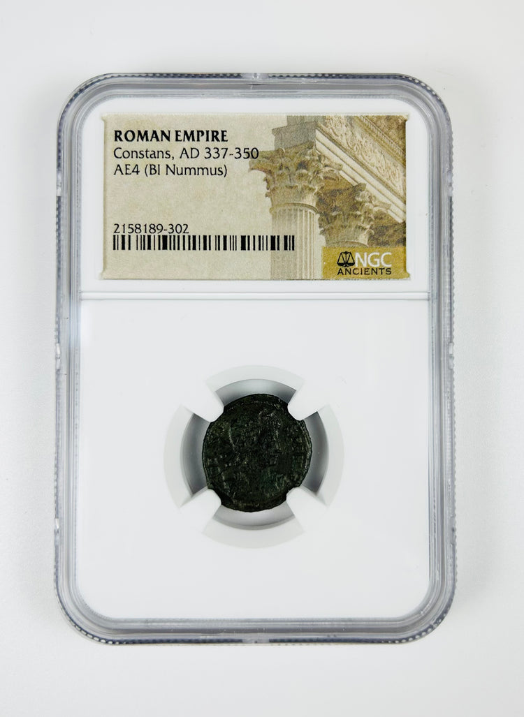 Late Roman Empire bronze coin depicting Emperor Constans, AE4 denomination, certified by NGC in protective holder.